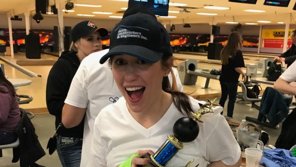 lady with bowling trophy
