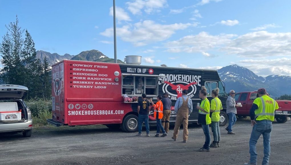 Employees in line at food truck